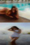 Man sucking nude woman breast